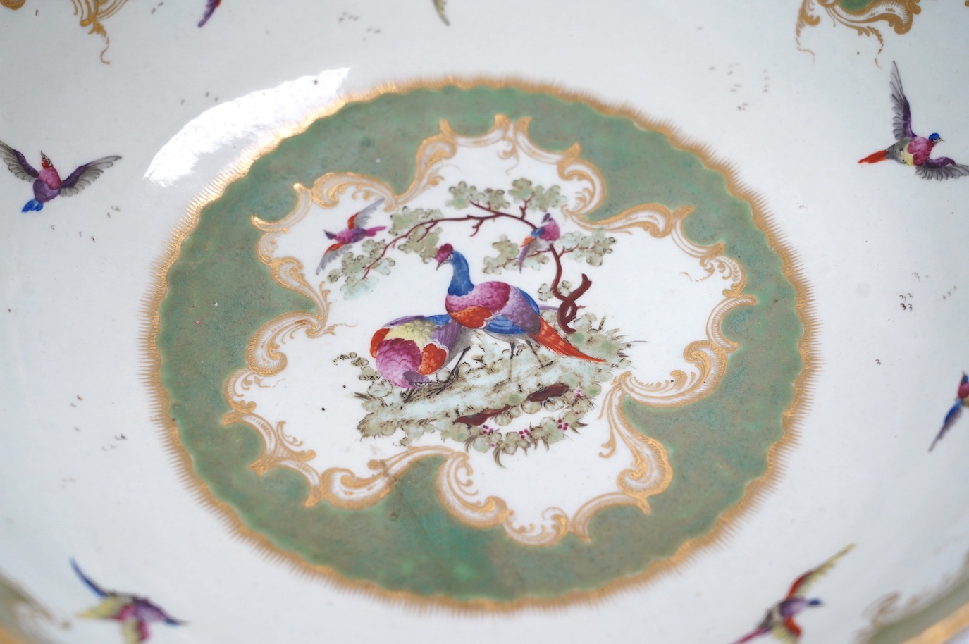 A large Worcester 'Fantastic Birds' bowl, c.1780, 28cm diameter. Condition - good, would benefit from a clean